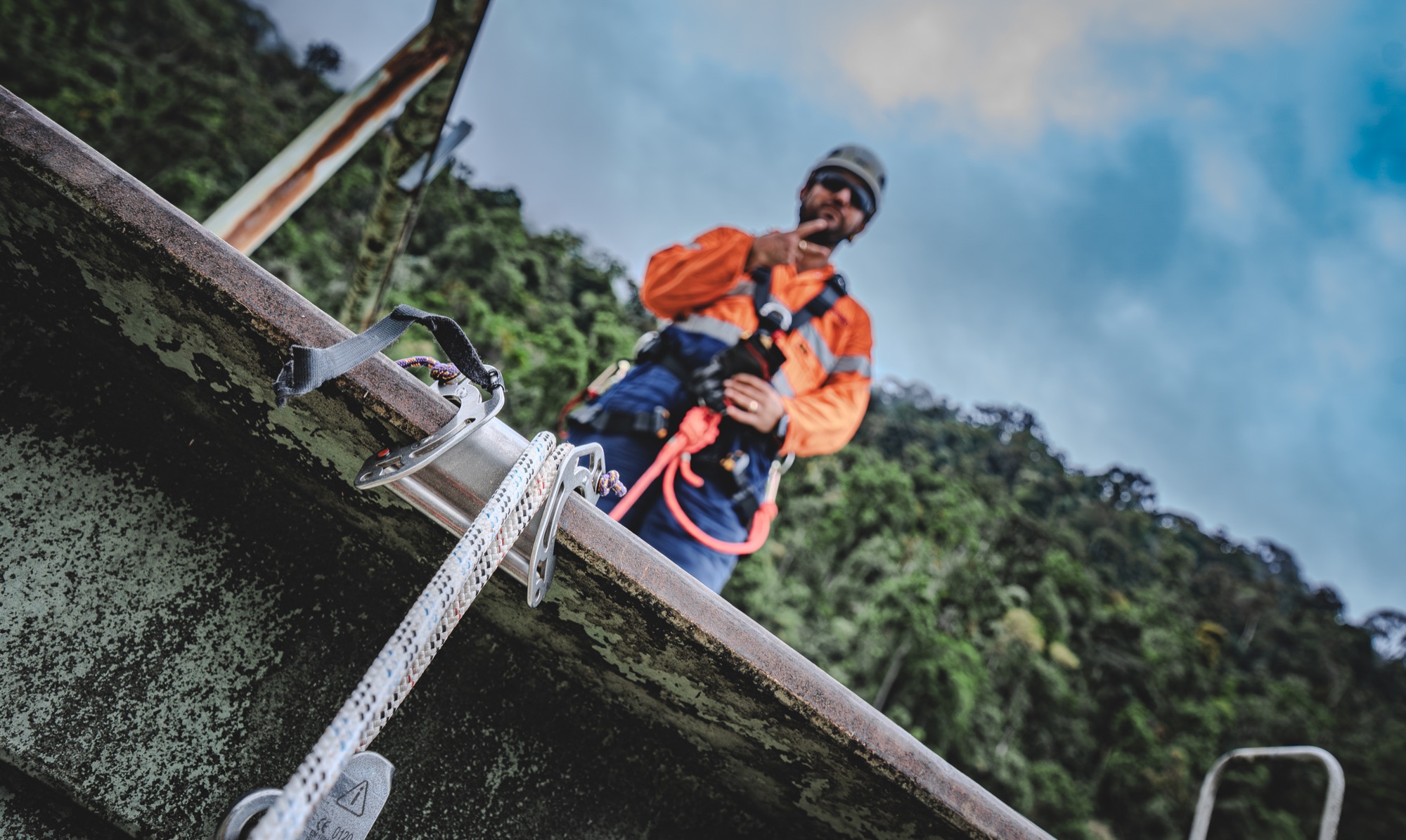 Rope-access technician rigged on a steel structure